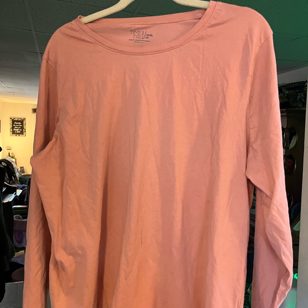 Long sleeve melon colored tee shirt